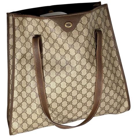 brown logo gucci bag|Gucci shoulder tote bag.